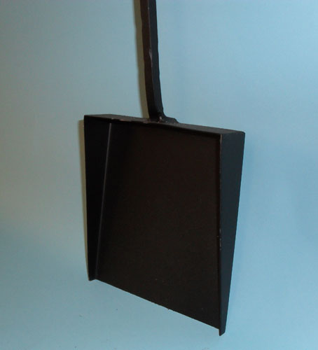 Fire shovel with hand forged balls and twist