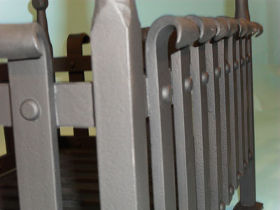 Fire grate, hand forged scrolls