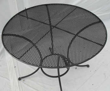 Large round table with perforated top - seats 4