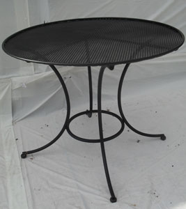 Large round table with perforated top - seats 4